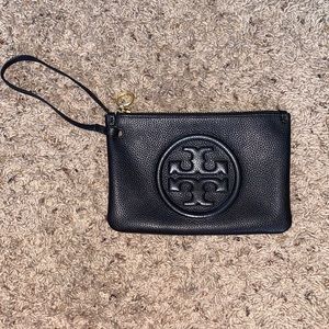 Tory Burch black with gold vintage wristlet